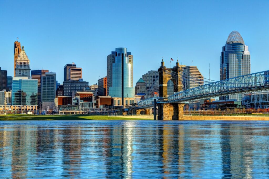 An image of the John A. Roebling bridge going over the Ohio river and into downtown Cincinnati